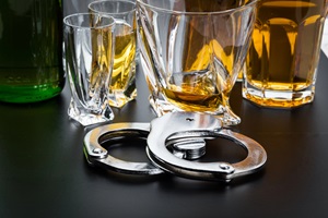 handcuffs and glasses on a table