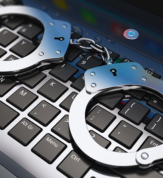 Handcuffs on a computer